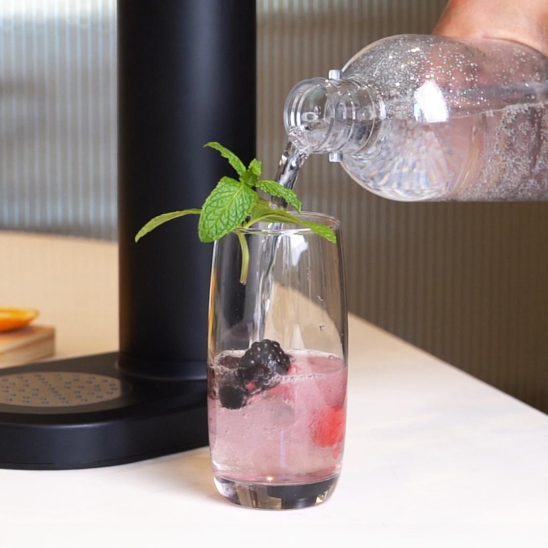 Sparkling water being made with a sleek