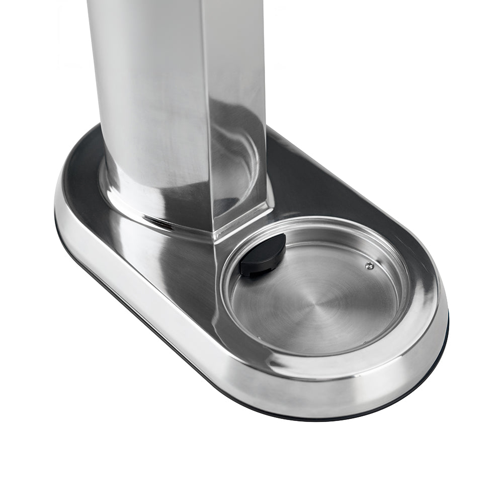 Close-up of the AGAVE Sparkling Water Maker's base, featuring a stainless steel surface and a built-in drainage groove designed